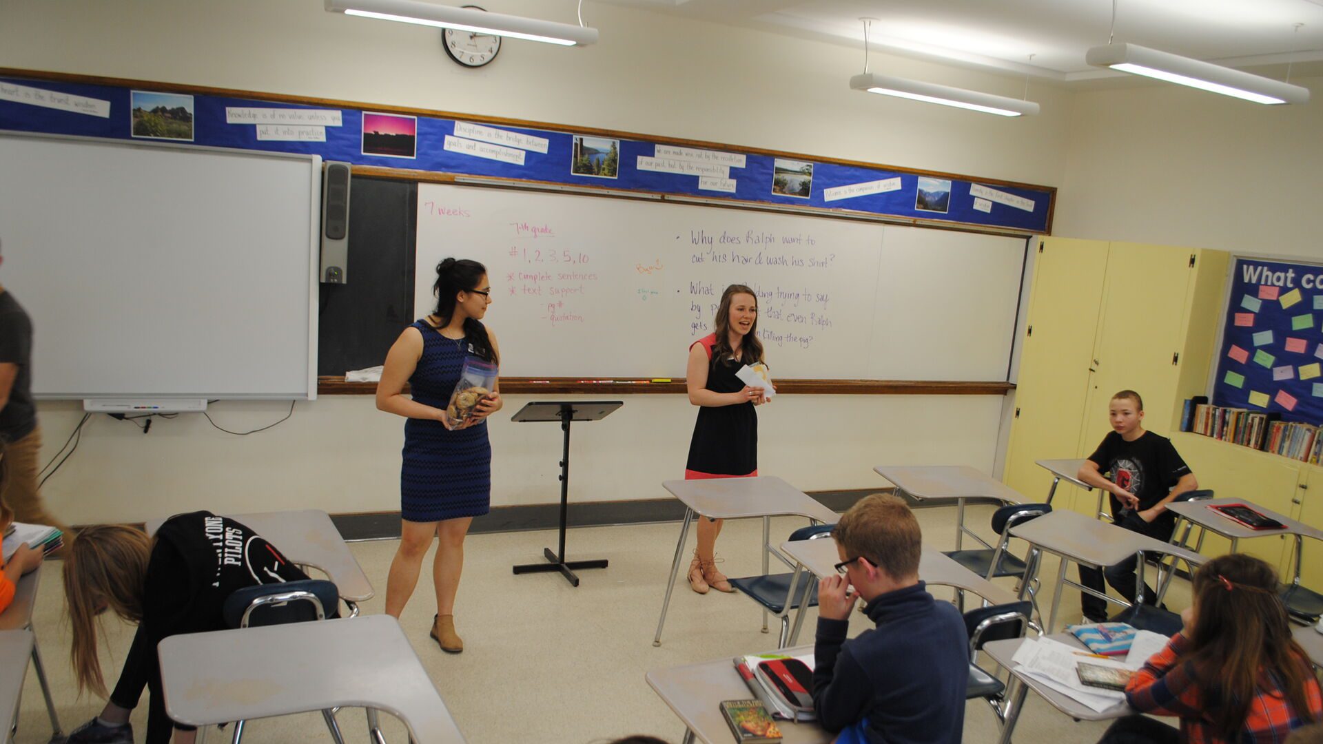 Student teachers presenting at the front of the class