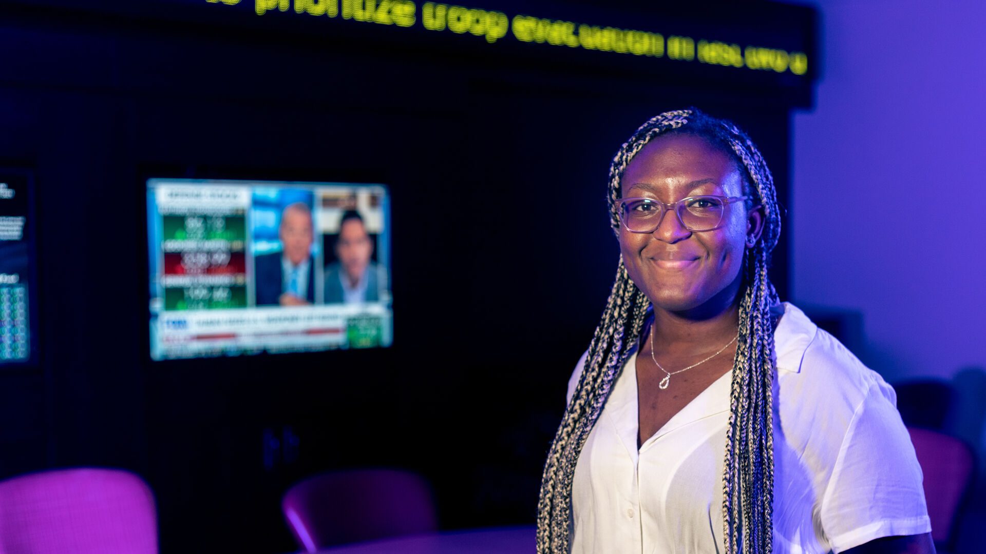 Ella Osuzoka in business conference room