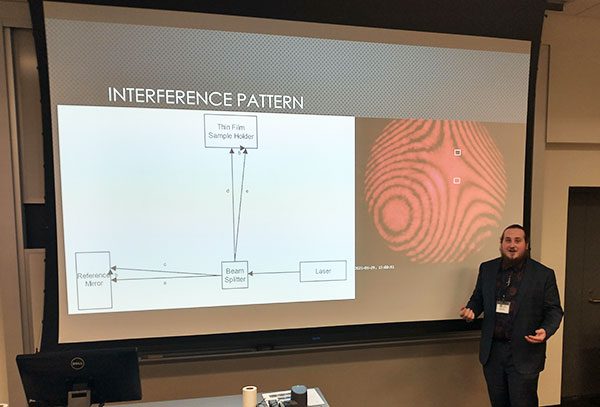 Student presenting at conference