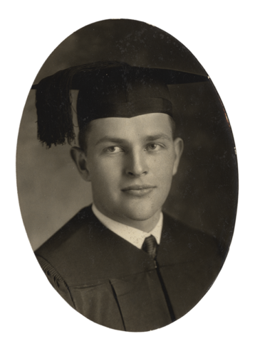 Black and white photograph of Allen Baker in commencement regalia.