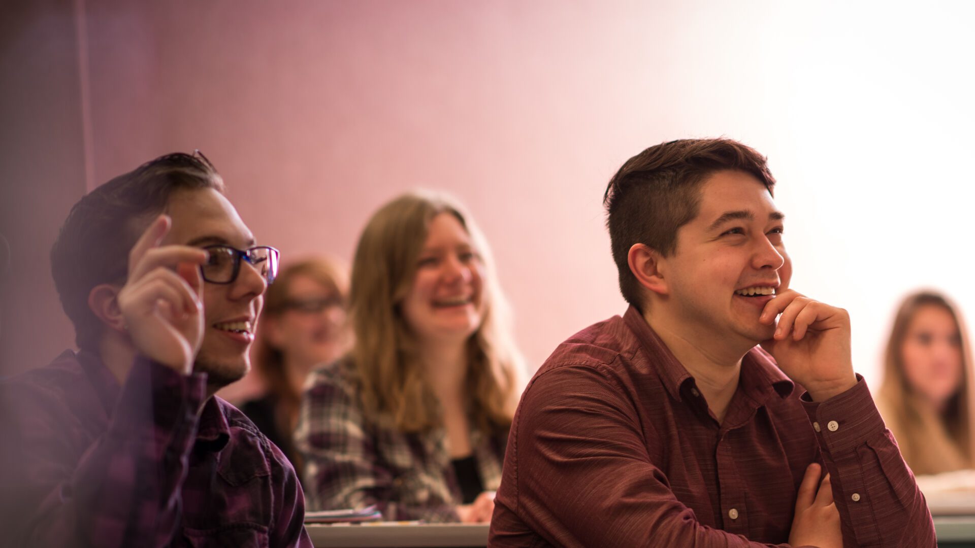 Students laughing during class discussion.