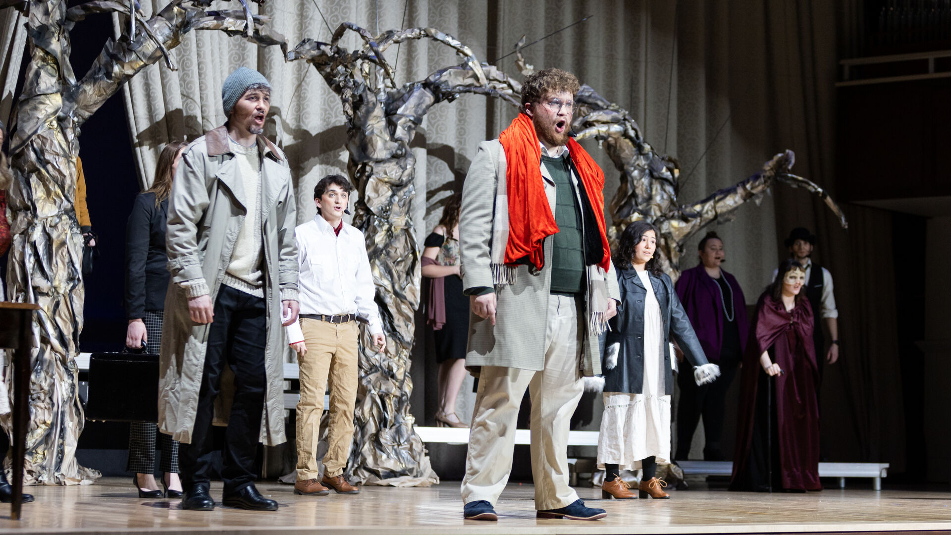 Houghton students singing during the Lyric Theatre production Into the Woods.