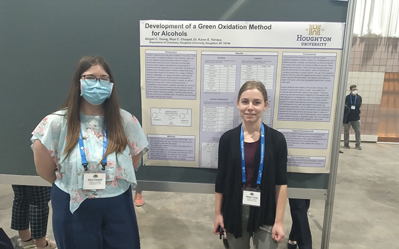 Skye Chaapel and Abigail Young with their poster on Green Oxidation