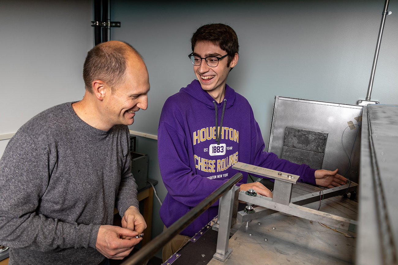 A Houghton student working with professor at