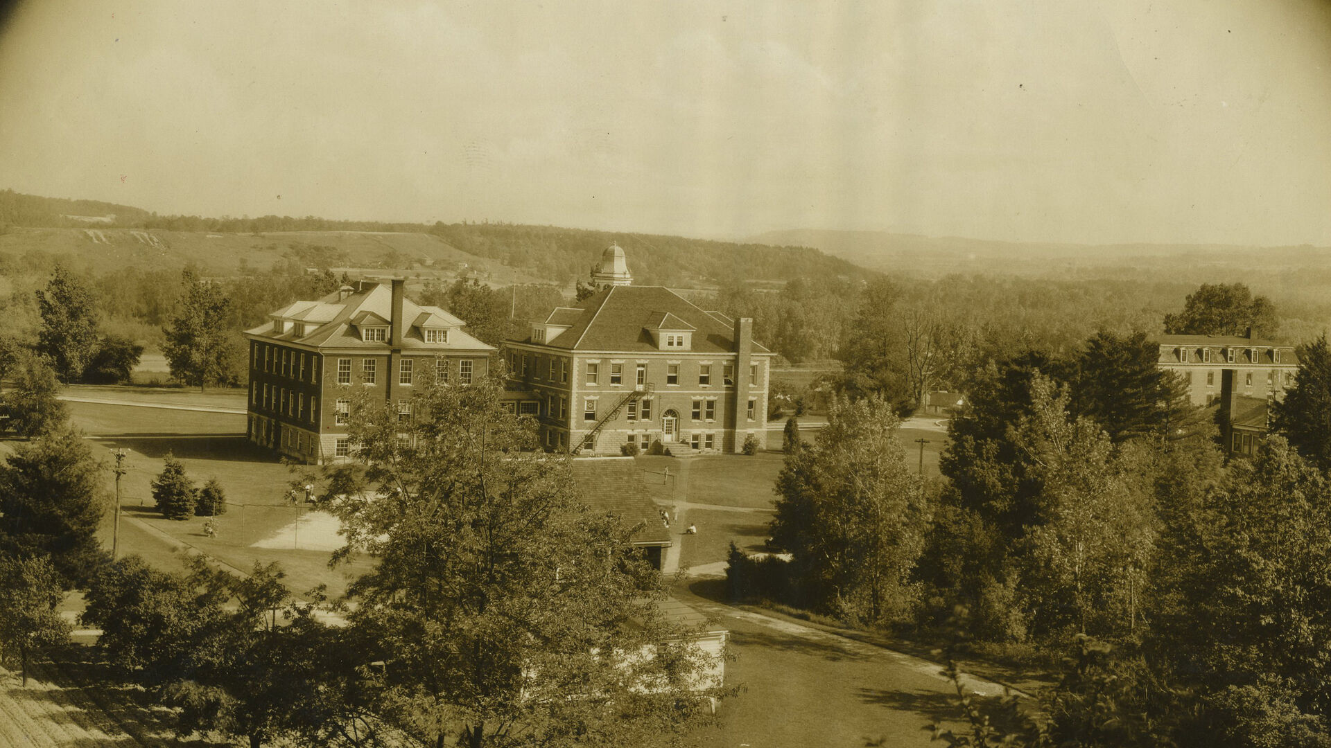 Historic sepia photo of Houghton University campus.
