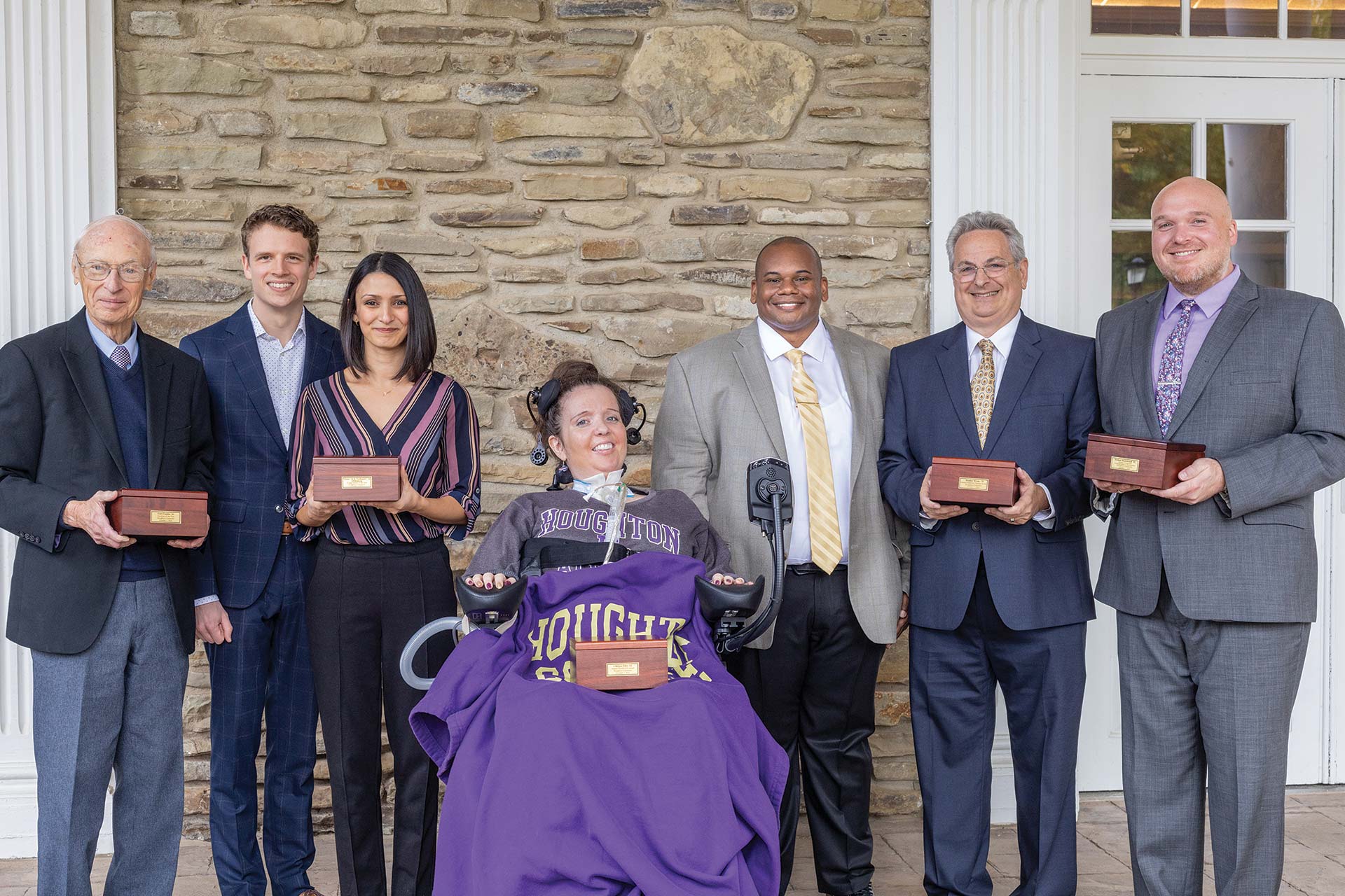 President Lewis with the alumni award winners.