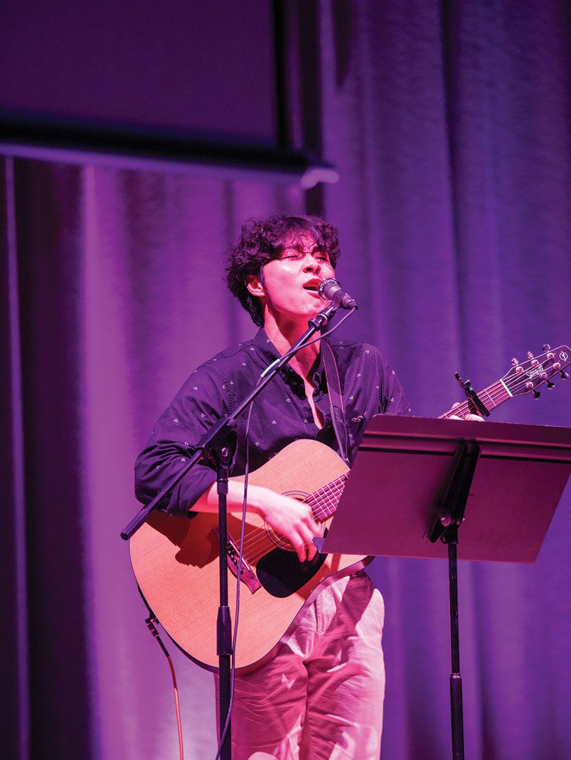 Houghton student singing during Homecoming Weekend.