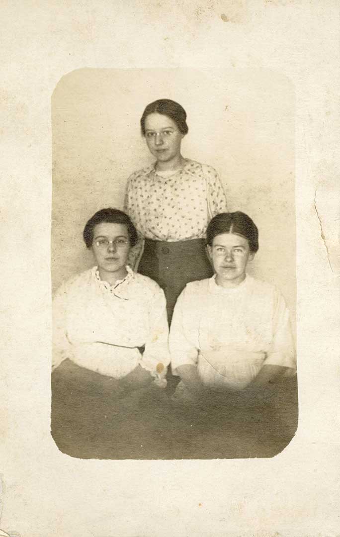 Archival photo of the three Warburton women sitting for portrait.