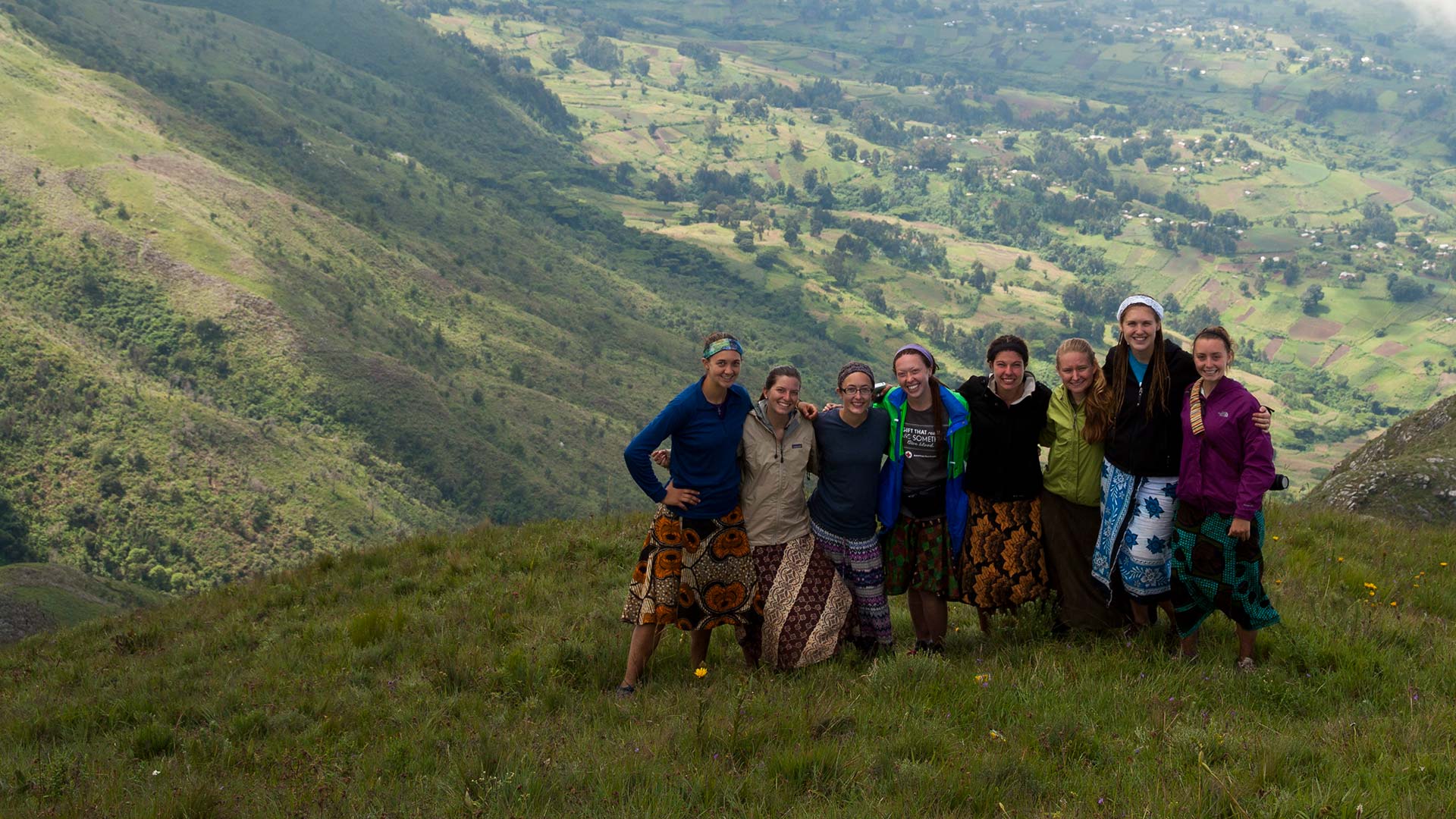 A group of Houghton students standing in hilltop in Tanzania.