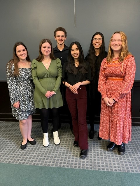 Six Houghton students standing together after being inducted into psychology honor society.