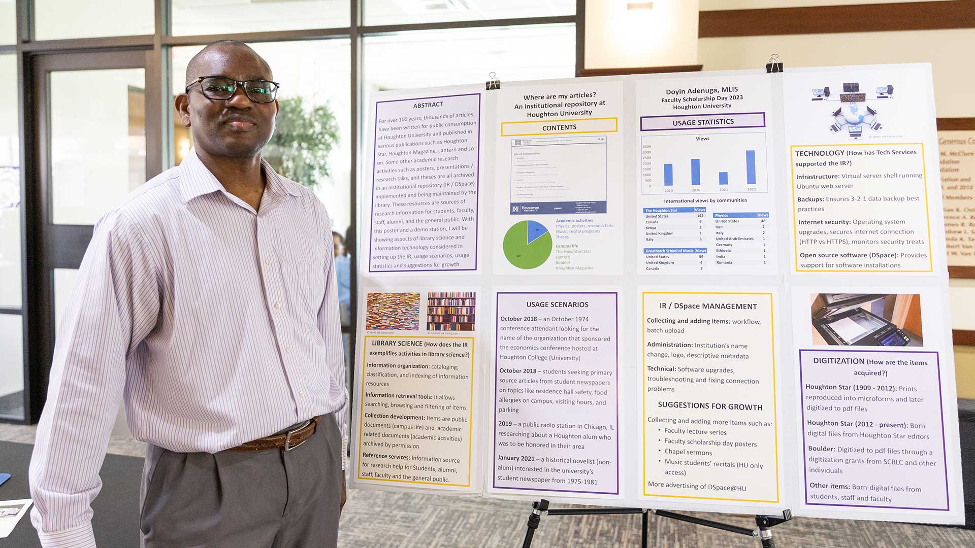 Doyin Adenuga standing next to his presentation at Faculty Scholarship Day at Houghton.