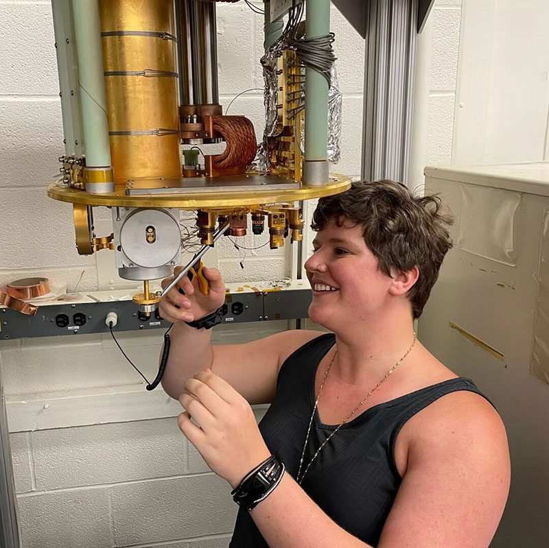 Katrina Koehler using lab instrument.