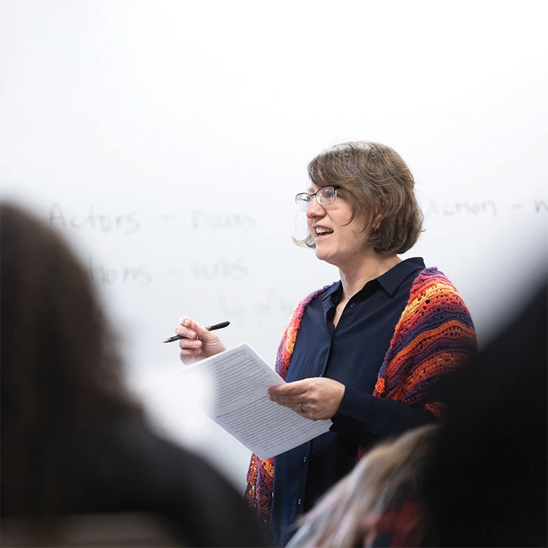 Houghton English professor Susan Bruxvoort Lipscomb lecturing to her class.