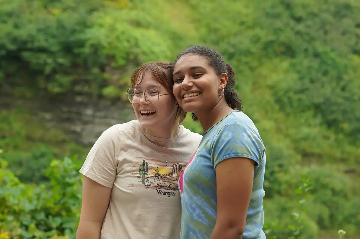 Two Houghton international interconnect students standing together.