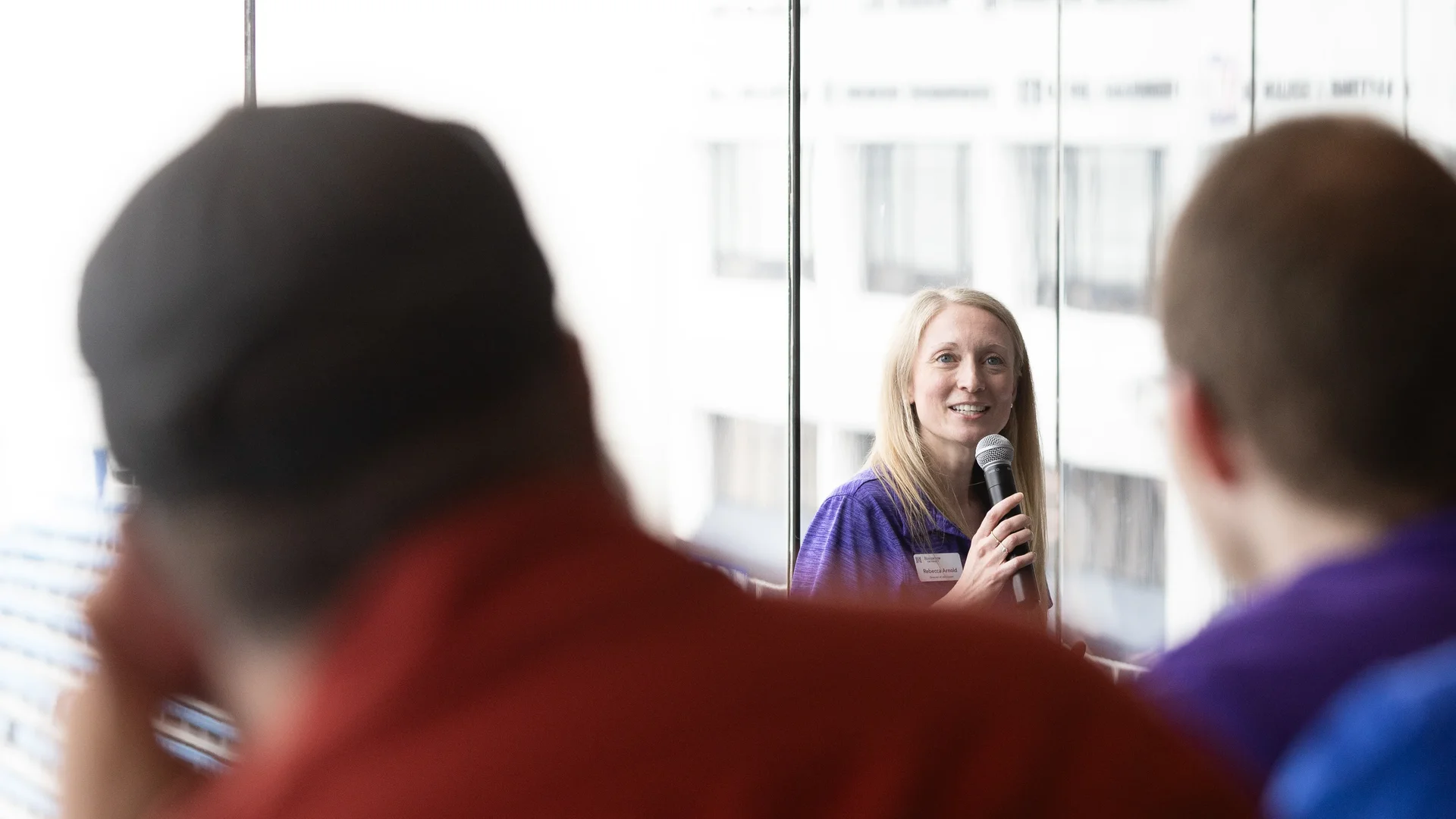 Houghton admission director speaking at accepted student event at Bills Stadium.