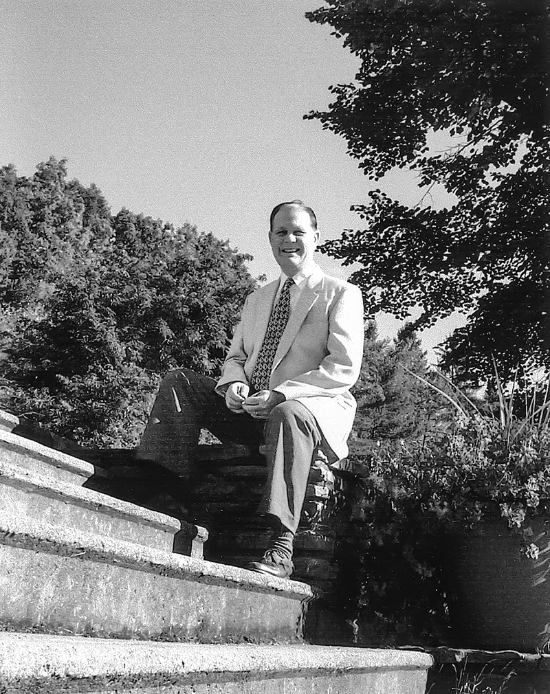 President emeritus Dan Chamberlain on the steps at Houghton.