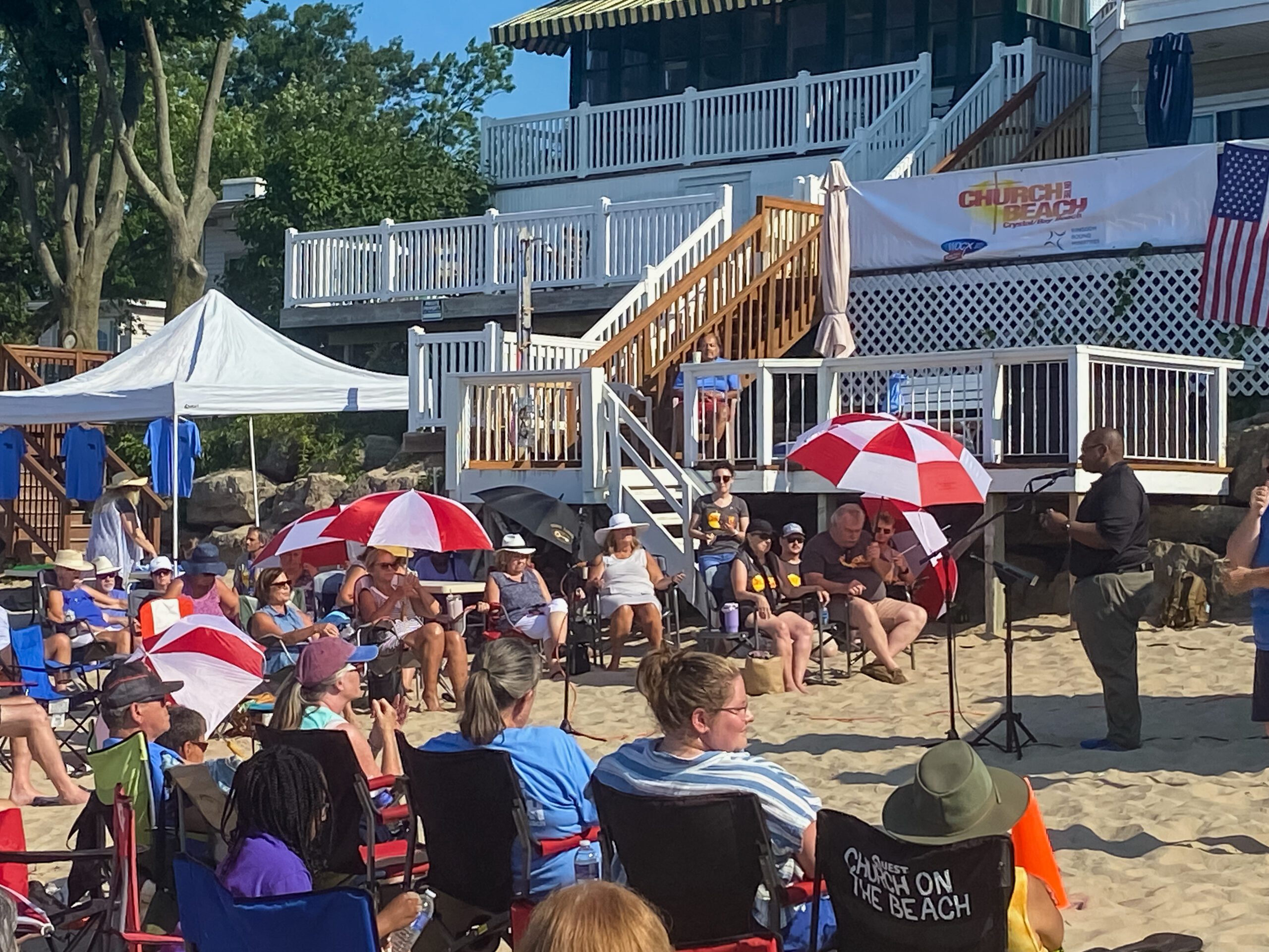 Houghton president, Wayne D. Lewis, Jr., preaching at church on the beach