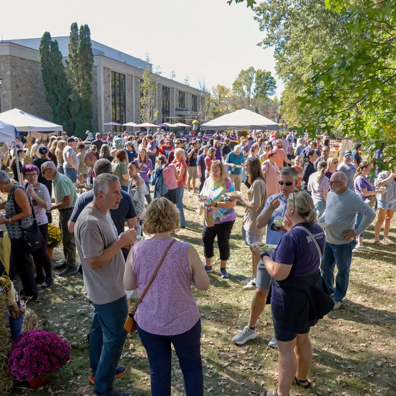 alumni talking on the quad