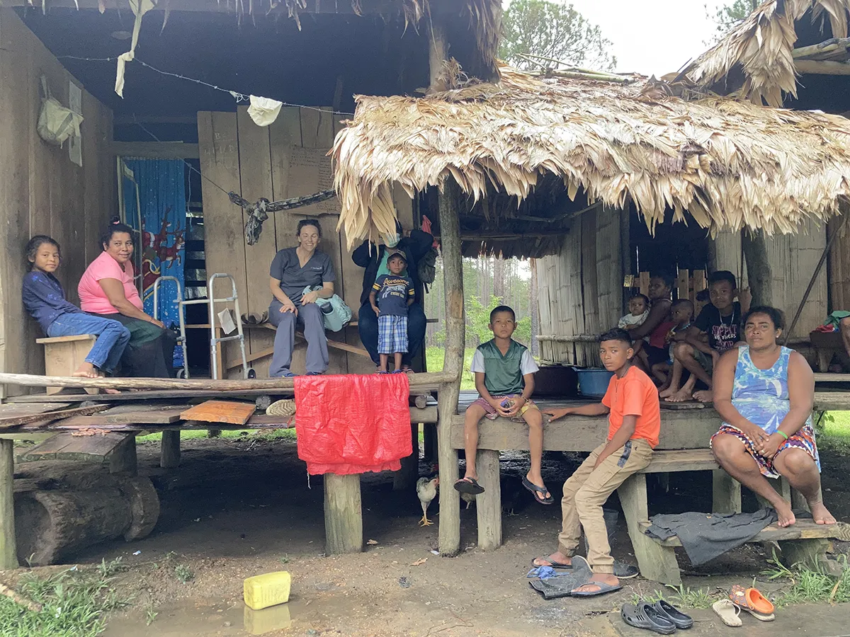 Houghton alumna Lynne Orozco in Honduras with local citizens.