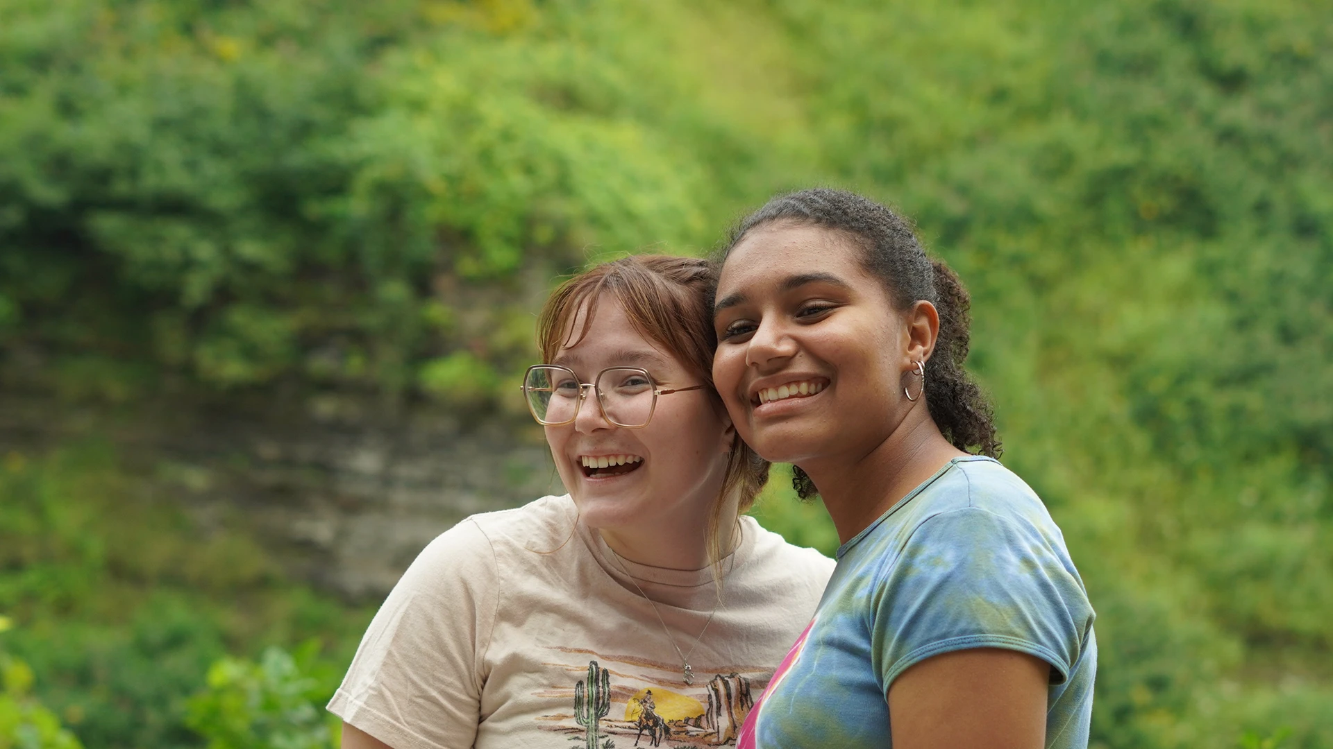 Two Houghton students at local park as part of Interconnect program.