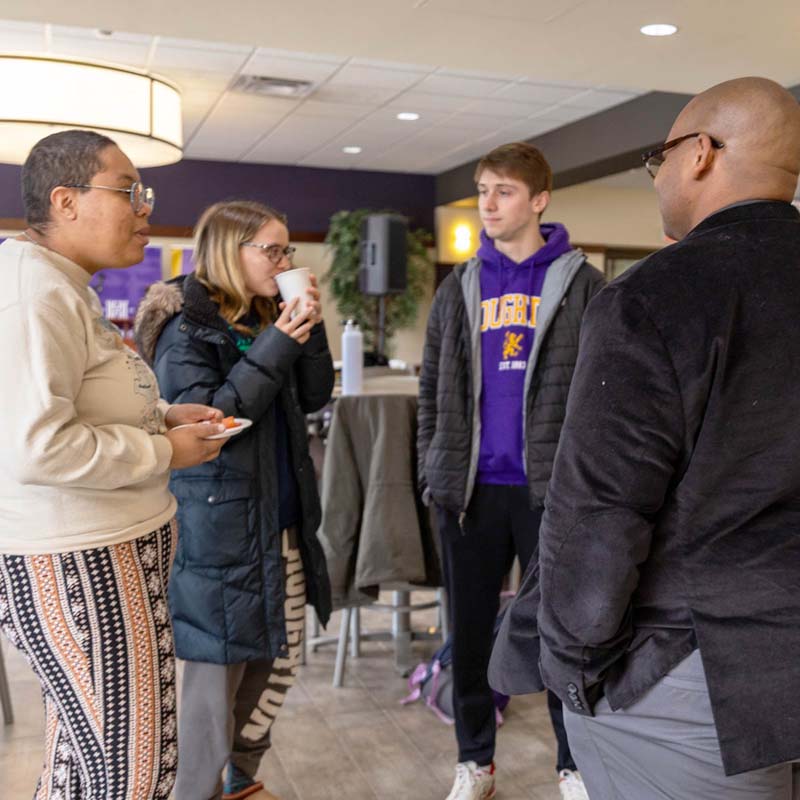 President Lewis talking to students