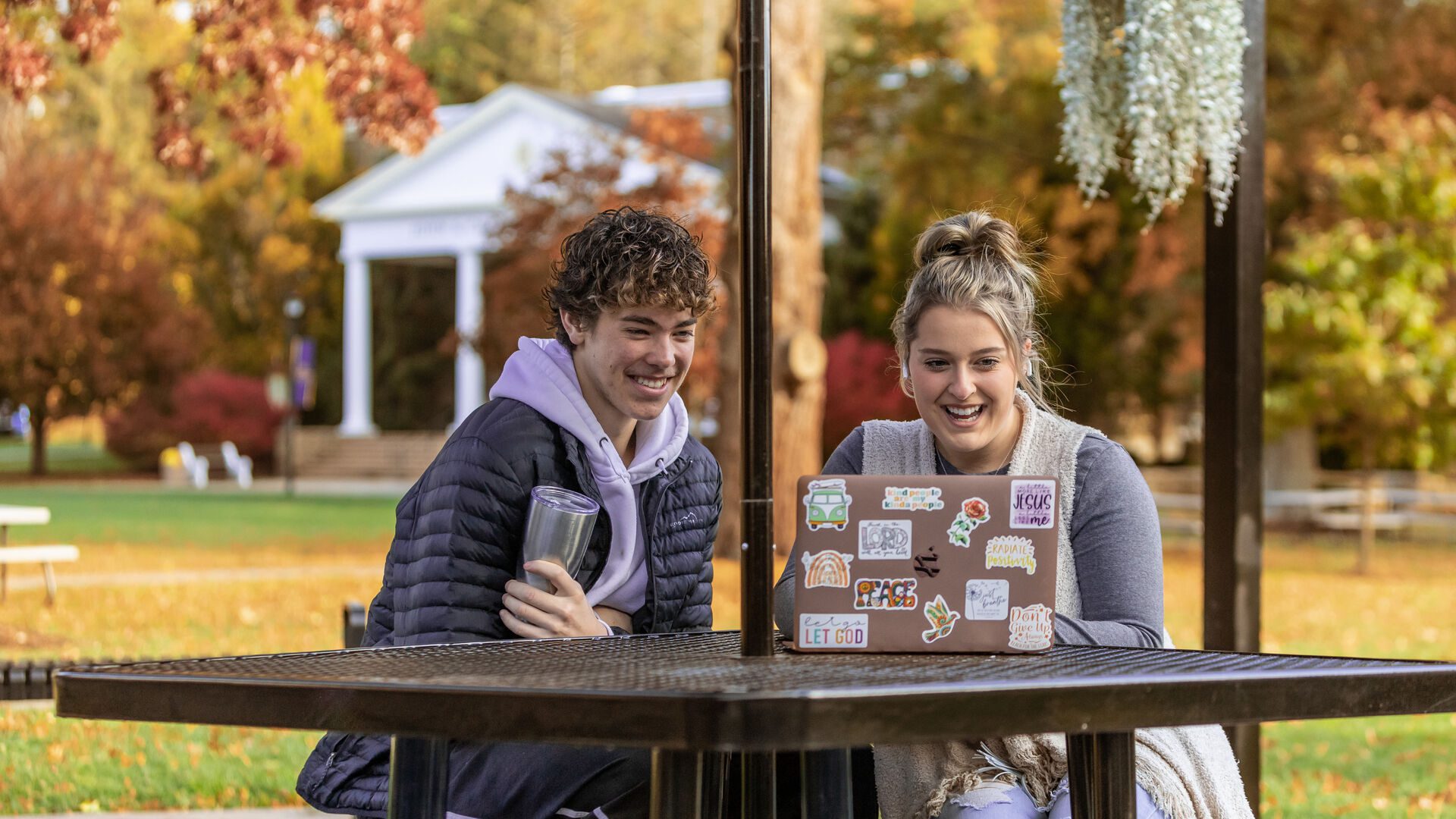 two Houghton students in Larder Courtyard