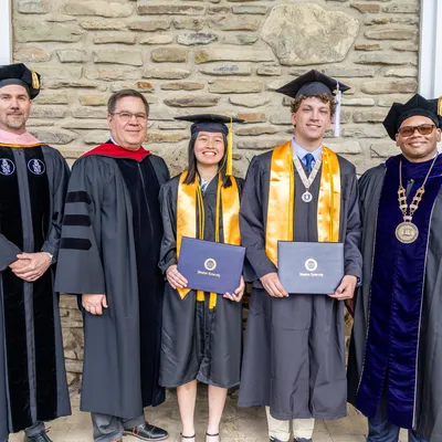 Dave Davies, Joey Jennings, Esther Tse, Noah Hunt, and President Wayne Lewis at graduation