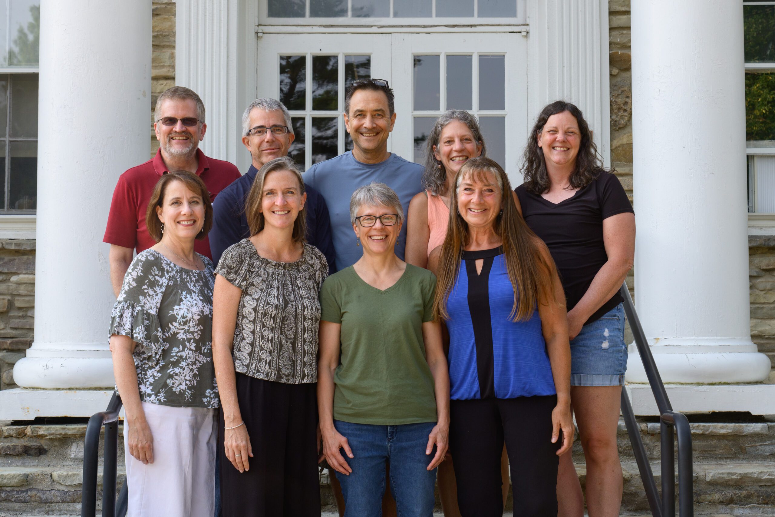 alumni group standing outside luckey